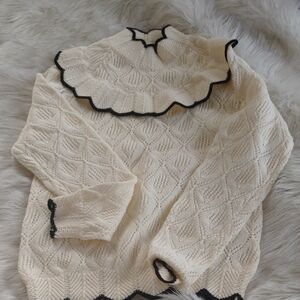 Chic Cream Turtleneck Sweater with Black Accents